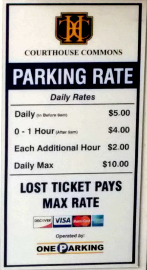 Photograph of a pricing sheet for a parking garage