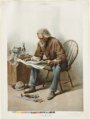 man reading a newspaper